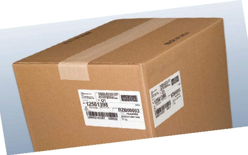 Shipping carton with a barcode ship-to label