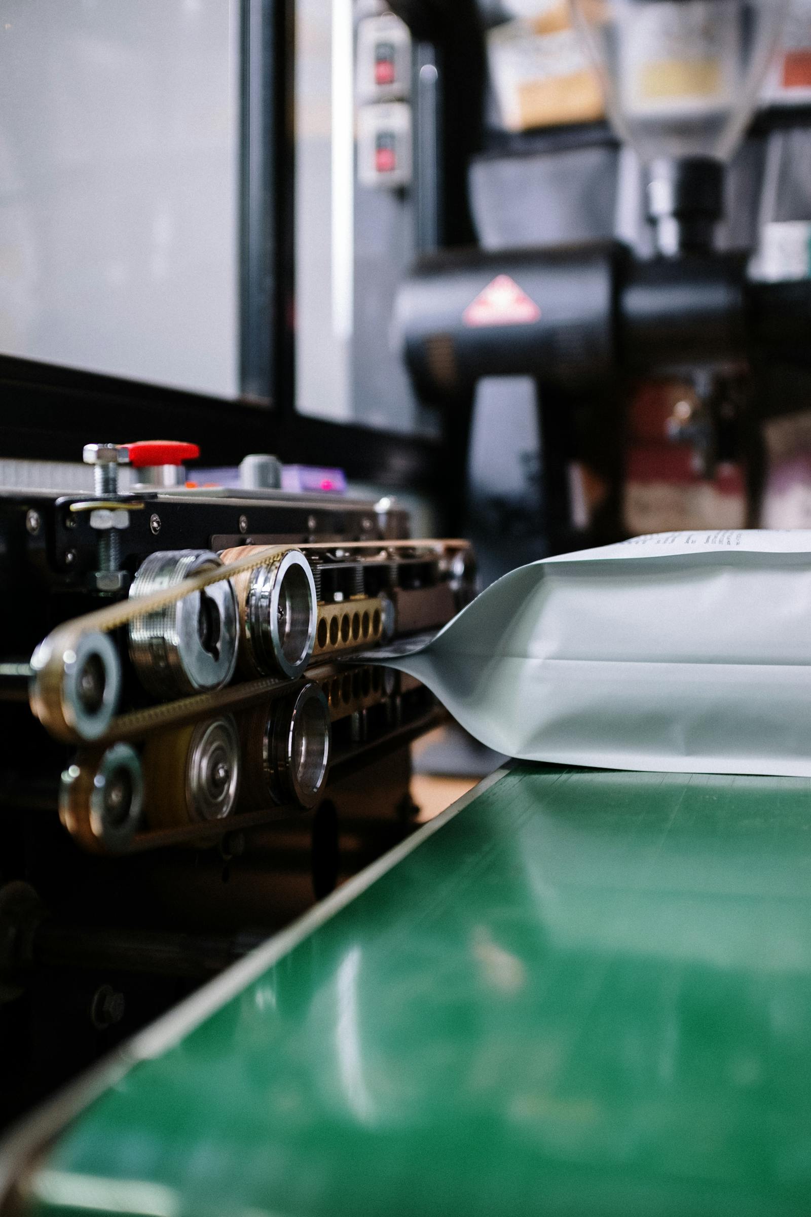 The converting line in our Tijuana plant turning film into finished mailers — the machine slots that fill first in October
