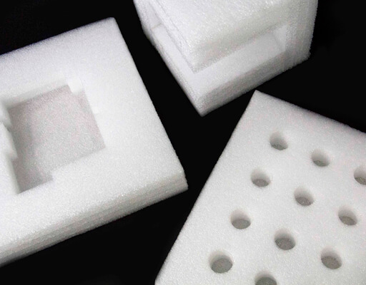Engineered protective foam — cavity insert, corner block, and perforated foam sheet